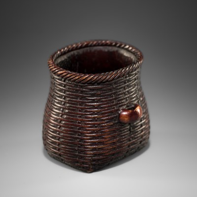 A FINE ANTLER NETSUKE IN THE FORM OF A WOVEN IKEBANA BASKET