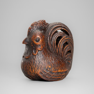Lot 632 - OKATOMO: A STAINED WOOD NETSUKE OF A COCKEREL