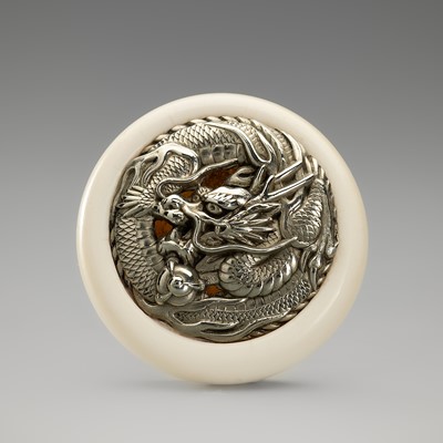 AN ANTLER AND SILVER KAGAMIBUTA DEPICTING A DRAGON