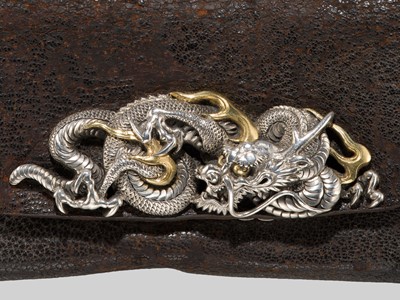 Lot 61 - KIKUGAWA: A LEATHER TABAKO-IRE (POUCH) WITH A SUPERB DRAGON GOLD AND SILVER KANAMONO (POUCH CLASP)