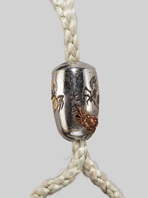 Lot 61 - KIKUGAWA: A LEATHER TABAKO-IRE (POUCH) WITH A SUPERB DRAGON GOLD AND SILVER KANAMONO (POUCH CLASP)