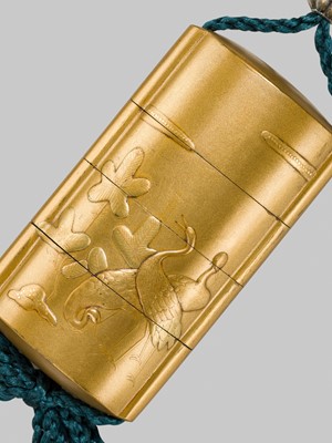 Lot 152 - A THREE-CASE GOLD-LACQUER INRO DEPICTING CRANES AMONG PINE SAPLINGS