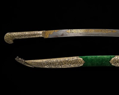 Lot 582 - AN INSCRIBED GOLD-INLAID STEEL SWORD WITH GILT-METAL REPOUSSÉ MOUNTS, YATAGHAN, EARLY 19TH CENTURY