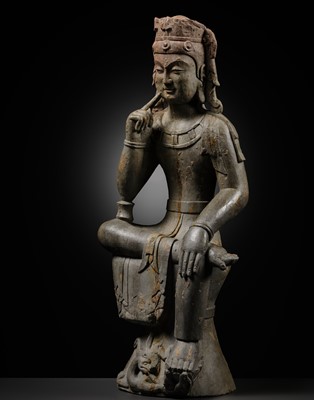 Lot 69 - A LIMESTONE FIGURE OF THE PENSIVE BODHISATTVA MAITREYA, NORTHERN QI DYNASTY