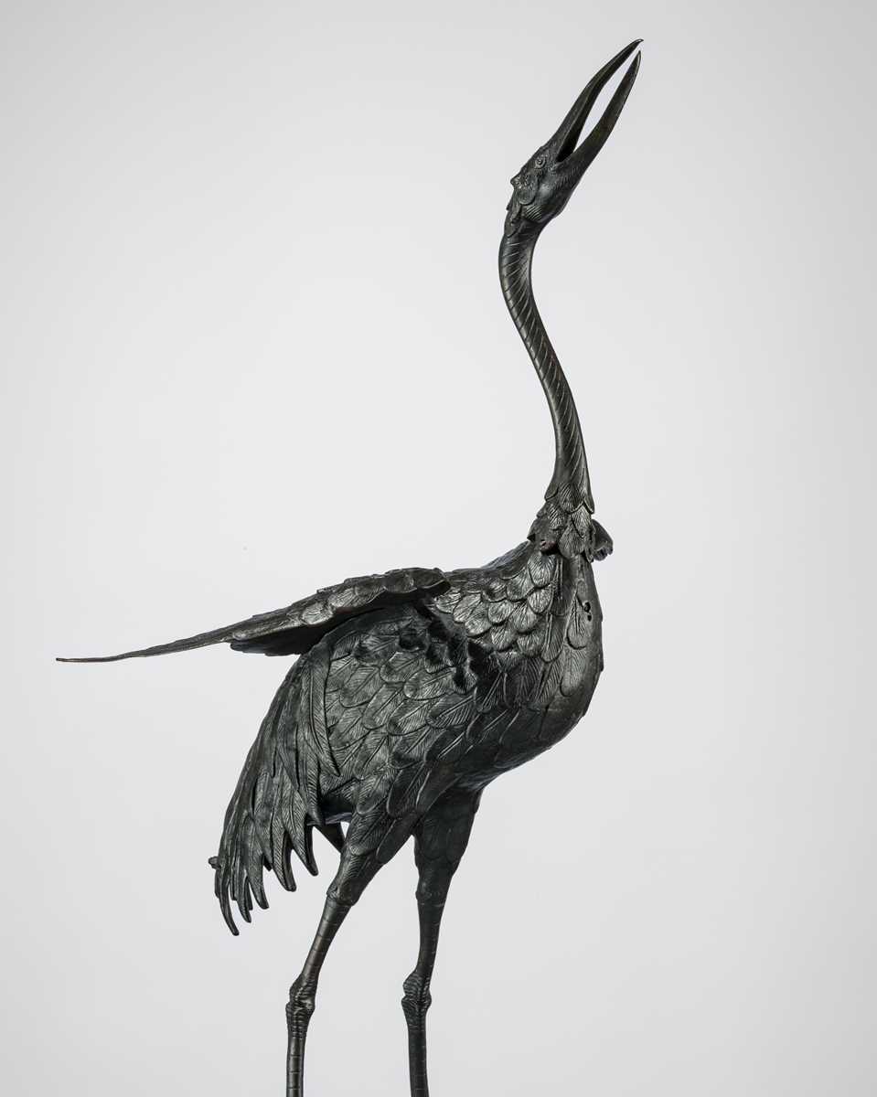 A VERY LARGE BRONZE FIGURE OF A CRANE