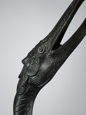 A VERY LARGE BRONZE FIGURE OF A CRANE