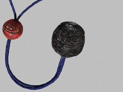 Lot 44 - A SUPERB AND LARGE EBONY WOOD THREE-CASE INRO DEPICTING TURTLES, WAFTING WAVES, AND A ROCK CRYSTAL BALL (YASAKI NO NAGATAMA)