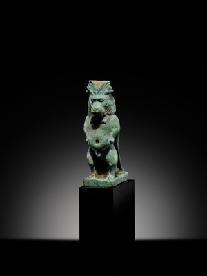 Lot 50 - A BLUE-GREEN FAIENCE ‘WINGED BABOON’ AMULET, THOTH, LATE PERIOD