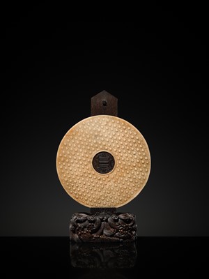 Lot 125 - A HIGHLY IMPORTANT ARCHAIC YELLOW JADE BI DISK, ON AN IMPERIALLY INSCRIBED ZITAN STAND, FROM THE PERSONAL COLLECTION OF THE QIANLONG EMPEROR (HONGLI)
