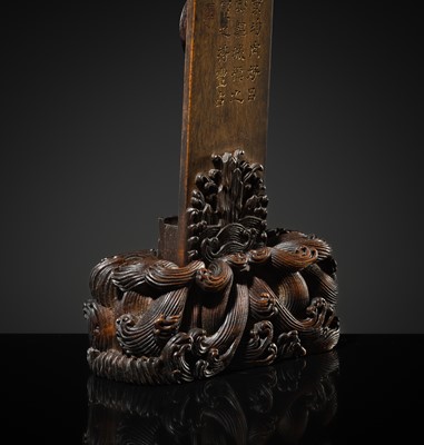 Lot 125 - A HIGHLY IMPORTANT ARCHAIC YELLOW JADE BI DISK, ON AN IMPERIALLY INSCRIBED ZITAN STAND, FROM THE PERSONAL COLLECTION OF THE QIANLONG EMPEROR (HONGLI)