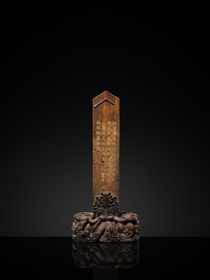 Lot 125 - A HIGHLY IMPORTANT ARCHAIC YELLOW JADE BI DISK, ON AN IMPERIALLY INSCRIBED ZITAN STAND, FROM THE PERSONAL COLLECTION OF THE QIANLONG EMPEROR (HONGLI)