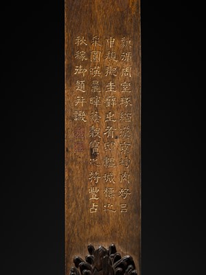 Lot 125 - A HIGHLY IMPORTANT ARCHAIC YELLOW JADE BI DISK, ON AN IMPERIALLY INSCRIBED ZITAN STAND, FROM THE PERSONAL COLLECTION OF THE QIANLONG EMPEROR (HONGLI)