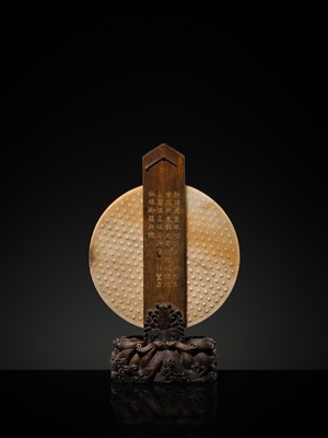 Lot 125 - A HIGHLY IMPORTANT ARCHAIC YELLOW JADE BI DISK, ON AN IMPERIALLY INSCRIBED ZITAN STAND, FROM THE PERSONAL COLLECTION OF THE QIANLONG EMPEROR (HONGLI)