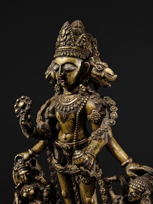A RARE AND LARGE SILVER-INLAID BRONZE FIGURE OF VAIKUNTHA VISHNU, KASHMIR, 9TH-10TH CENTURY