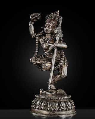 Lot 318 - A FINE SILVER FIGURE OF DANCING VAJRAVARAHI, TIBET, 18TH-19TH CENTURY