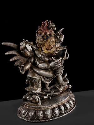 Lot 35 - A GILT-LACQUERED AND PAINTED SILVER FIGURE OF SUPERSECRET HAYAGRIVA AND CONSORT, TIBET, 18TH-19TH CENTURY