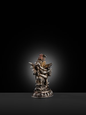 Lot 35 - A GILT-LACQUERED AND PAINTED SILVER FIGURE OF SUPERSECRET HAYAGRIVA AND CONSORT, TIBET, 18TH-19TH CENTURY
