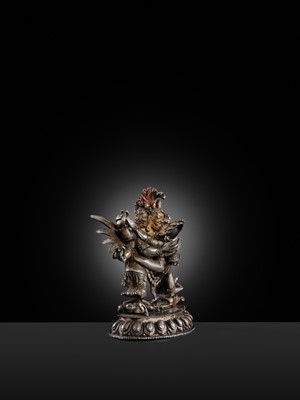 Lot 35 - A GILT-LACQUERED AND PAINTED SILVER FIGURE OF SUPERSECRET HAYAGRIVA AND CONSORT, TIBET, 18TH-19TH CENTURY