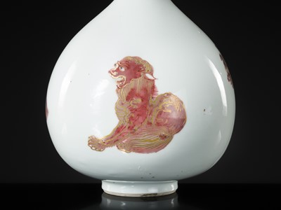 Lot 161 - AN ABSOLUTELY PERFECT AND THUS EXTREMELY RARE GILT AND COPPER-RED ‘THREE BEASTS’ BOTTLE VASE, KANGXI PERIOD