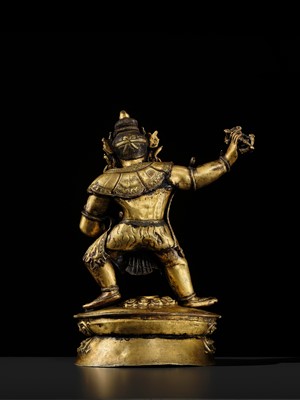 Lot 32 - A LARGE GILT-BRONZE FIGURE OF VAJRAPANI, TIBET, 16TH-17TH CENTURY