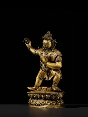 Lot 32 - A LARGE GILT-BRONZE FIGURE OF VAJRAPANI, TIBET, 16TH-17TH CENTURY