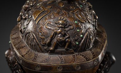 Lot 33 - A KAPALA (SKULL CUP) WITH SEPARATE COPPER ALLOY COVER AND STAND, TIBET, 18TH-19TH CENTURY