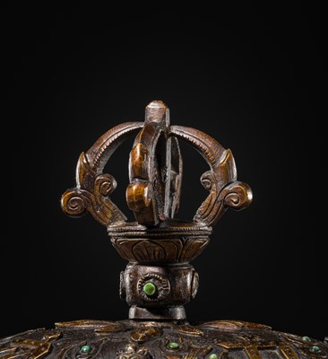Lot 33 - A KAPALA (SKULL CUP) WITH SEPARATE COPPER ALLOY COVER AND STAND, TIBET, 18TH-19TH CENTURY