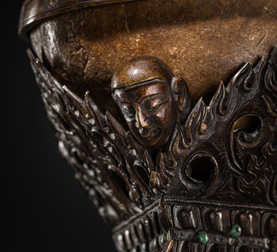 Lot 33 - A KAPALA (SKULL CUP) WITH SEPARATE COPPER ALLOY COVER AND STAND, TIBET, 18TH-19TH CENTURY