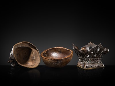 Lot 33 - A KAPALA (SKULL CUP) WITH SEPARATE COPPER ALLOY COVER AND STAND, TIBET, 18TH-19TH CENTURY