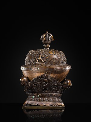 Lot 33 - A KAPALA (SKULL CUP) WITH SEPARATE COPPER ALLOY COVER AND STAND, TIBET, 18TH-19TH CENTURY