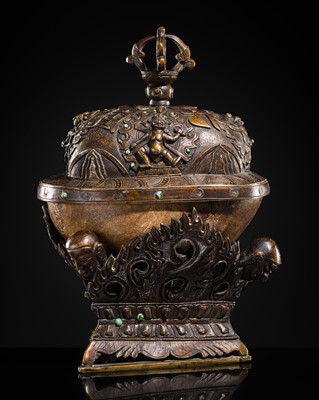 Lot 33 - A KAPALA (SKULL CUP) WITH SEPARATE COPPER ALLOY COVER AND STAND, TIBET, 18TH-19TH CENTURY