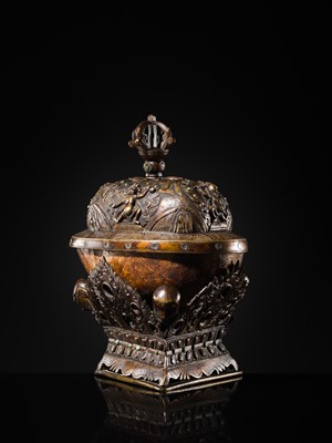 Lot 33 - A KAPALA (SKULL CUP) WITH SEPARATE COPPER ALLOY COVER AND STAND, TIBET, 18TH-19TH CENTURY