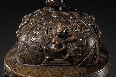 Lot 33 - A KAPALA (SKULL CUP) WITH SEPARATE COPPER ALLOY COVER AND STAND, TIBET, 18TH-19TH CENTURY
