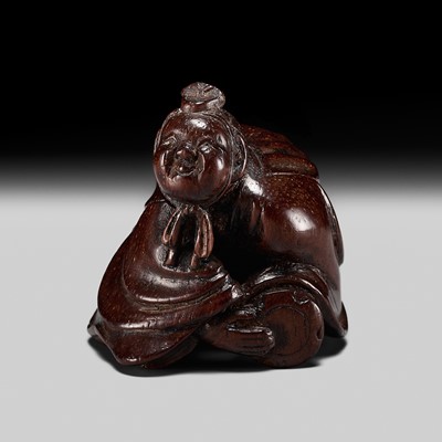 HIDEKAZU: A FINE WOOD NETSUKE OF A MANZAI DRUMMER