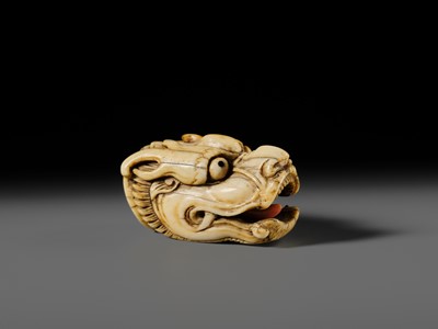 Lot 113 - A VERY RARE CORAL INLAID IVORY NETSUKE OF A SEVERED DRAGON HEAD