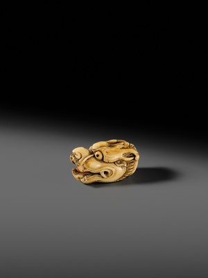 Lot 113 - A VERY RARE CORAL INLAID IVORY NETSUKE OF A SEVERED DRAGON HEAD