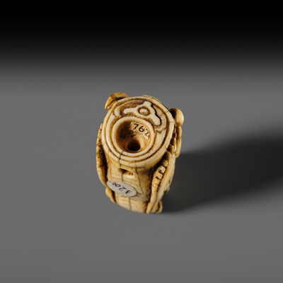 Lot 113 - A VERY RARE CORAL INLAID IVORY NETSUKE OF A SEVERED DRAGON HEAD