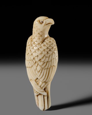 Lot 363 - A RARE MARINE TOOTH NETSUKE OF A HAWK