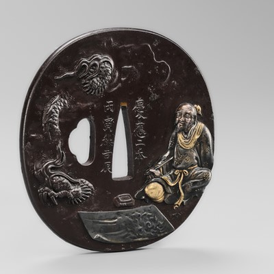 WATAI TANETORA: A SUPERB MITO SCHOOL IRON TSUBA DEPICTING SO FUKO AND DRAGON, DATED 1866