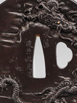 WATAI TANETORA: A SUPERB MITO SCHOOL IRON TSUBA DEPICTING SO FUKO AND DRAGON, DATED 1866