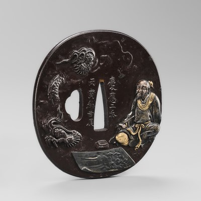 WATAI TANETORA: A SUPERB MITO SCHOOL IRON TSUBA DEPICTING SO FUKO AND DRAGON, DATED 1866