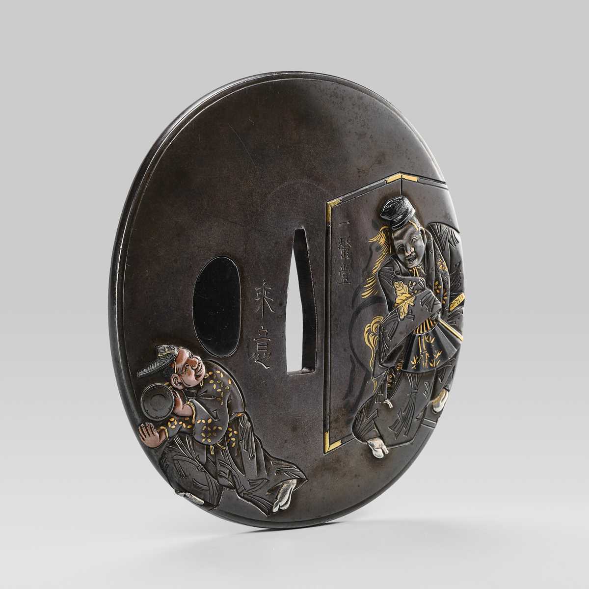 SUGIURA JOI: A SUPERB SHIBUICHI TSUBA WITH MANZAI DANCERS