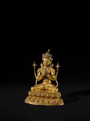 Lot 16 - AN INLAID GILT-BRONZE FIGURE OF VAJRADHARA, NEPAL, MALLA PERIOD, 15TH CENTURY