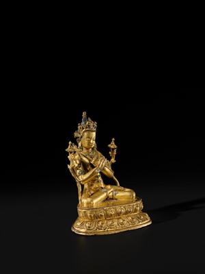 Lot 16 - AN INLAID GILT-BRONZE FIGURE OF VAJRADHARA, NEPAL, MALLA PERIOD, 15TH CENTURY