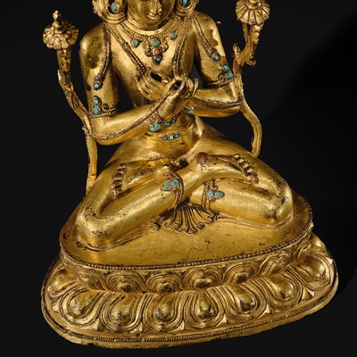 Lot 16 - AN INLAID GILT-BRONZE FIGURE OF VAJRADHARA, NEPAL, MALLA PERIOD, 15TH CENTURY