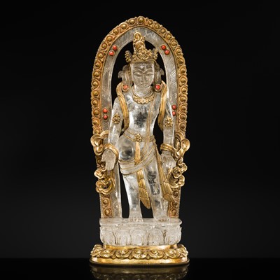 Lot 284 - A RARE GILT-BRONZE DECORATED ROCK CRYSTAL FIGURE OF AVALOKITESHVARA, TIBET