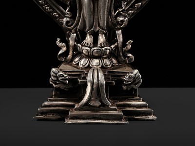 Lot 34 - A SILVER FIGURE OF AVALOKITESHVARA SAHASRABHUJA EKADASAMUKHA