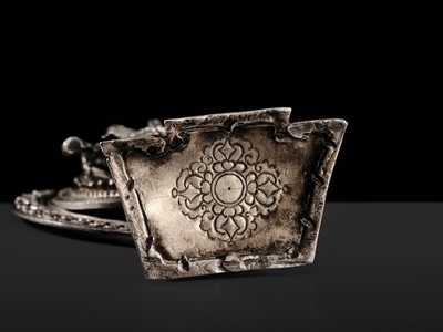 Lot 34 - A SILVER FIGURE OF AVALOKITESHVARA SAHASRABHUJA EKADASAMUKHA