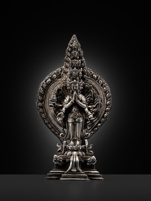 Lot 34 - A SILVER FIGURE OF AVALOKITESHVARA SAHASRABHUJA EKADASAMUKHA