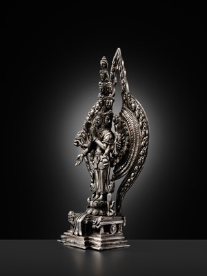 Lot 34 - A SILVER FIGURE OF AVALOKITESHVARA SAHASRABHUJA EKADASAMUKHA